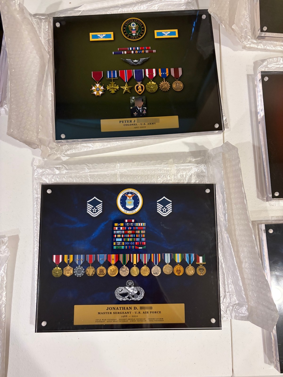 Two finished acrylic Valor Blocks for an Army Colonel and an Air Force Master Sergeant