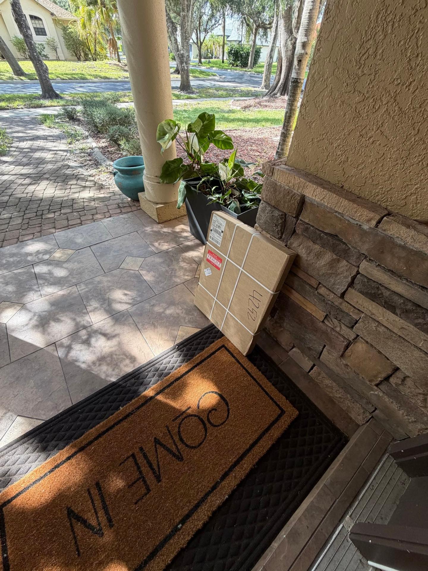 Valor Canvas package delivered and waiting on a front porch