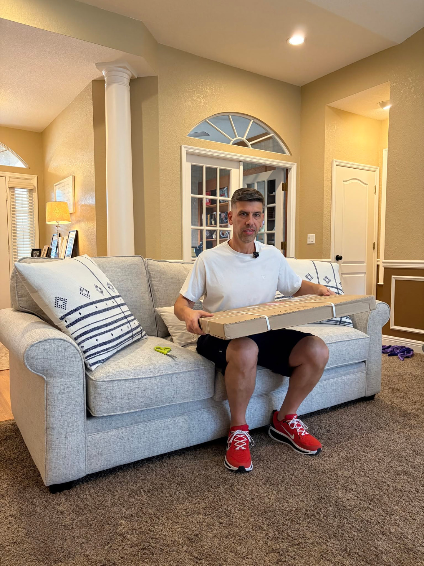 Founder Matt Menster holding the sealed Valor Canvas shipping box